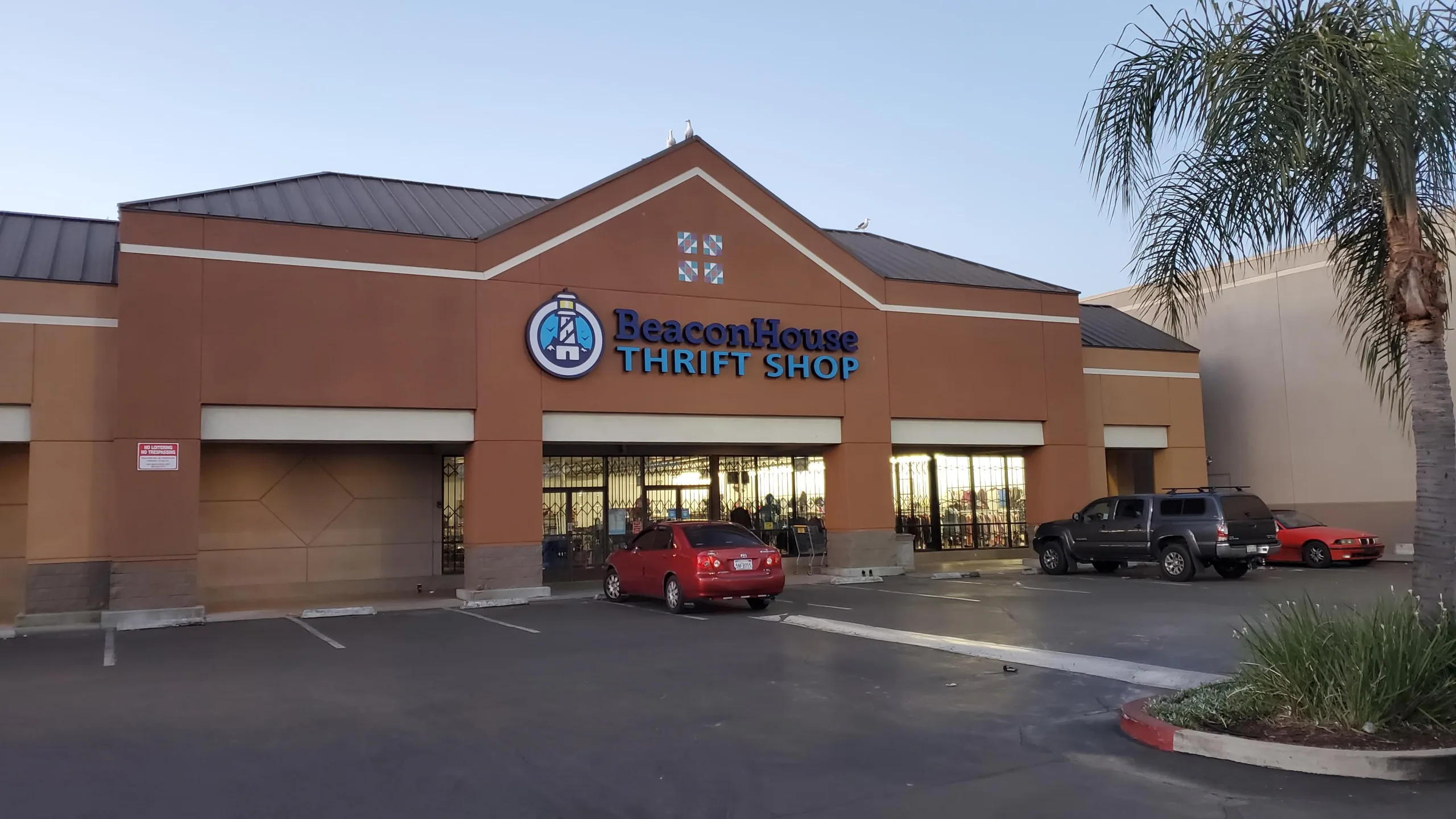A Long Beach Store Front with a sign reading BeaconHouse Exchange Thrift Shop